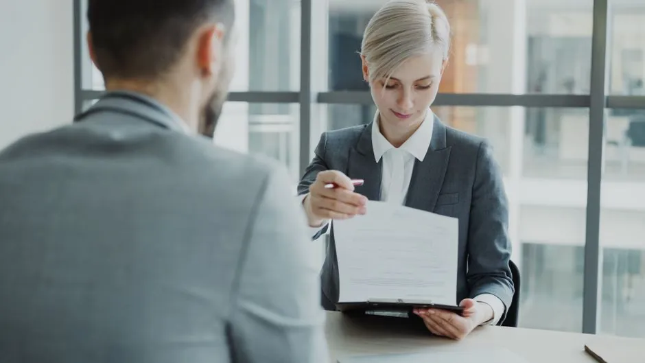 HR manager reviewing candidate score reports
