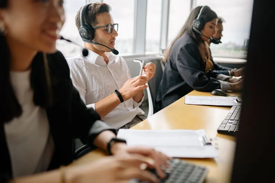 Call center team working at their stations