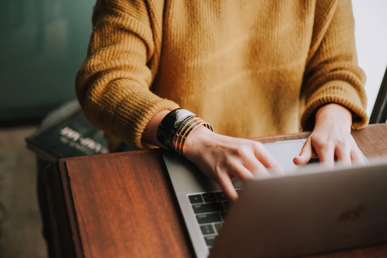 Student taking an online English proficiency test on a laptop